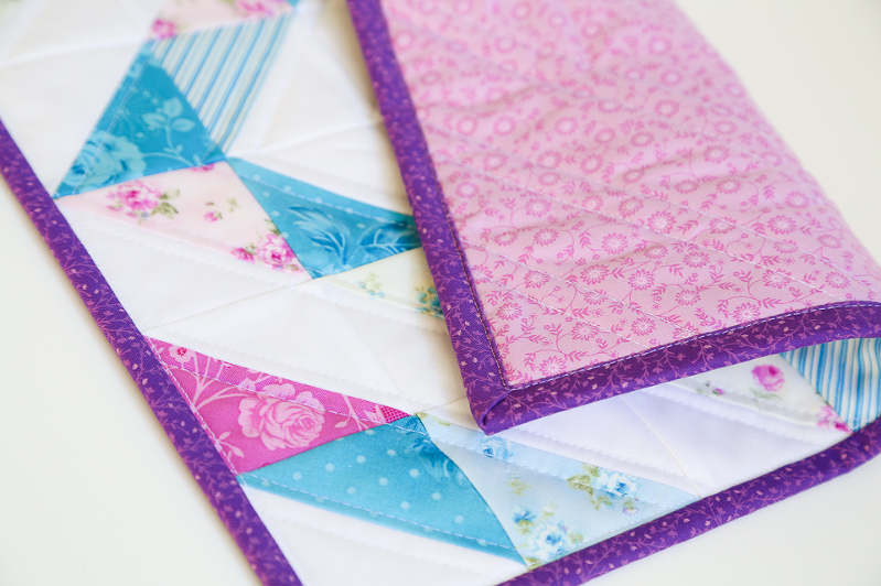 half square triangles, quilting with HST, HST quilt, mini charm squares quilt, eleanor burns quilt, quilts with diamonds, quilts for girls, mini quilts, floral mini quilts, purple quilts, blue quilts